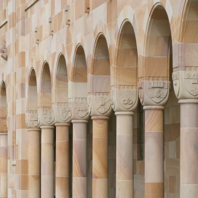 Closeup of UQ's cloister columns with the carvings visible